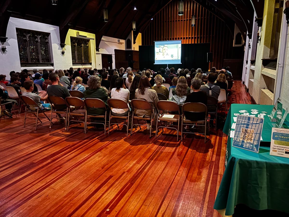 A packed community talk about phones and childhood