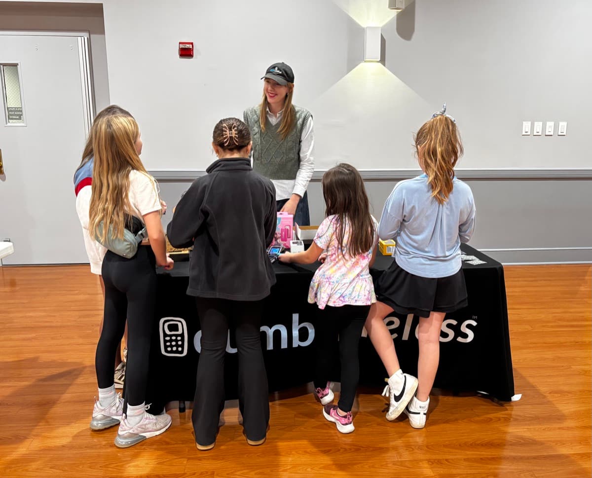 Kids gathered around a table at a PA Unplugged event